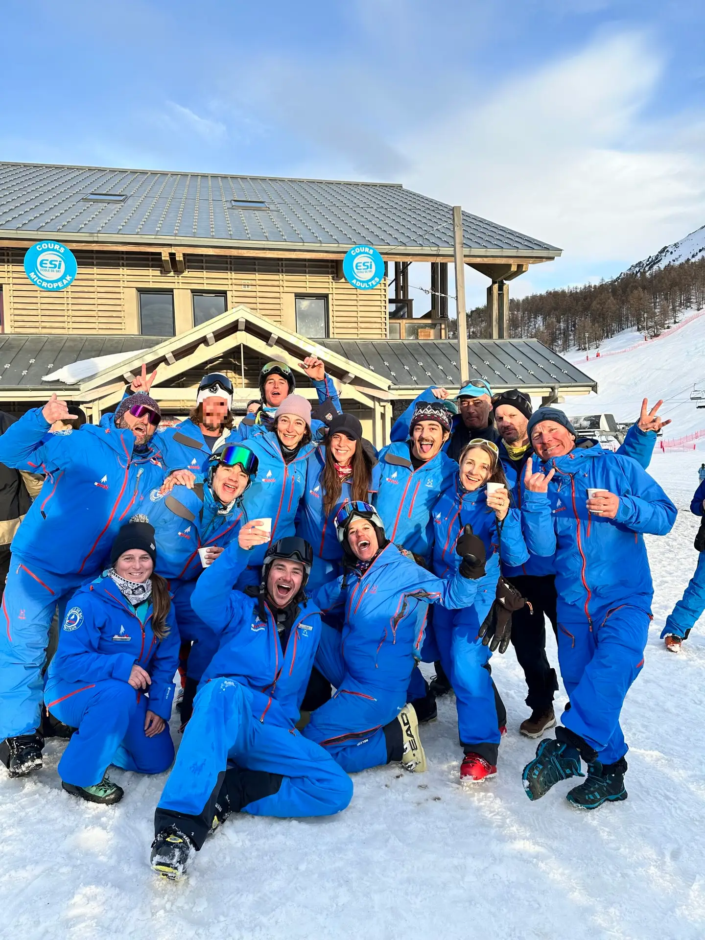 APeak Montgenèvre instructors on the snow front with their guests